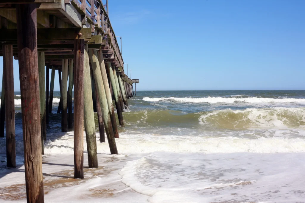 Surf beside the Virginia Beach fishing pier.