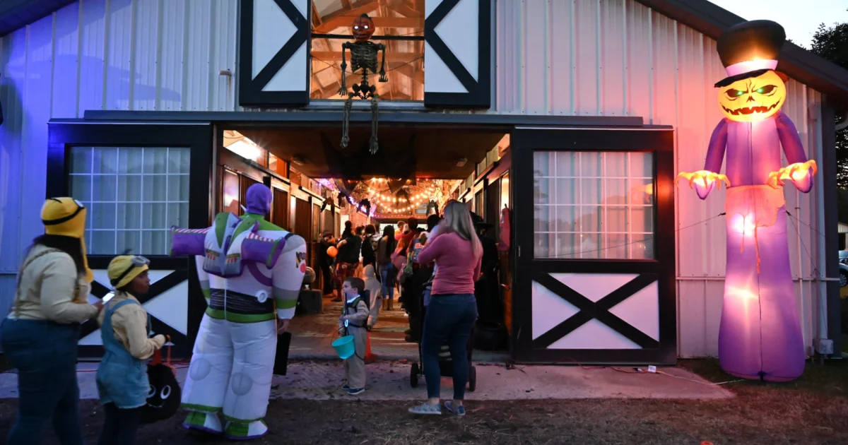 Families in costumes at a Virginia Beach Halloween gathering