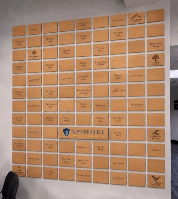 Neptune SHIELD Plank Owner recognition wall